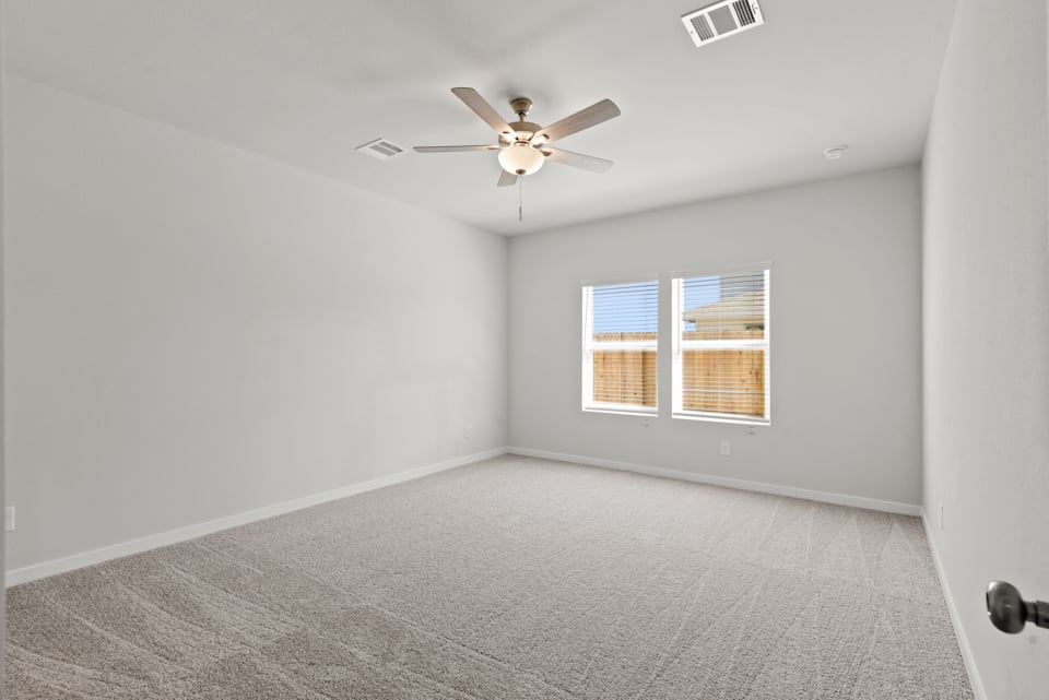 A ceiling fan in a room.