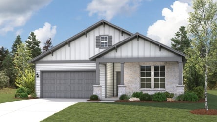 A house with a garage with American Gothic House in the background.