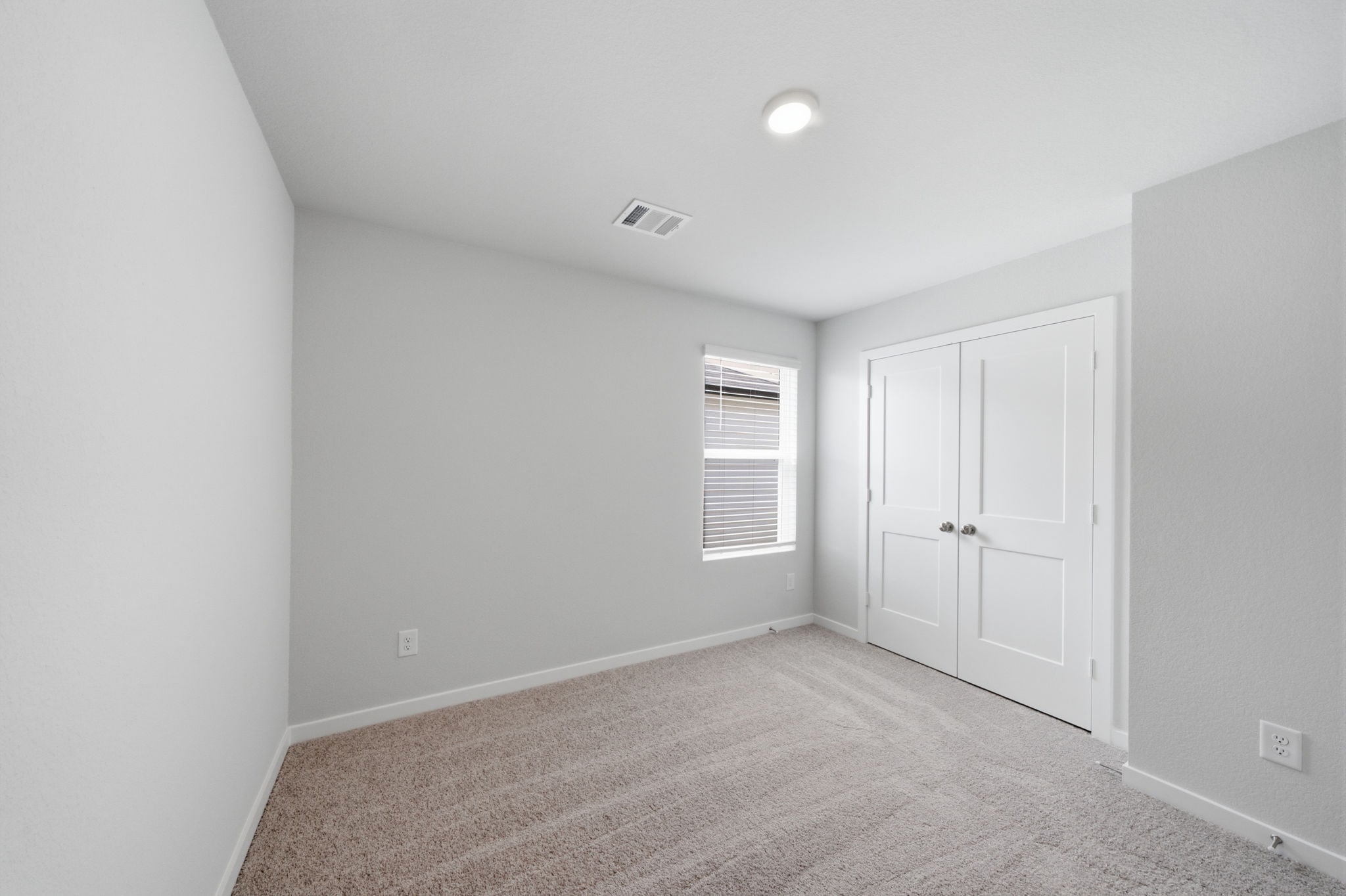 A room with white doors.