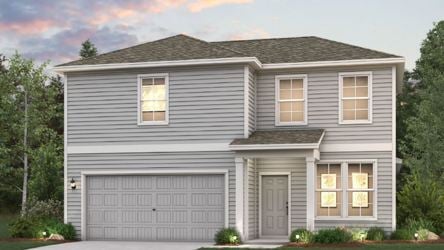 A grey house with a garage.