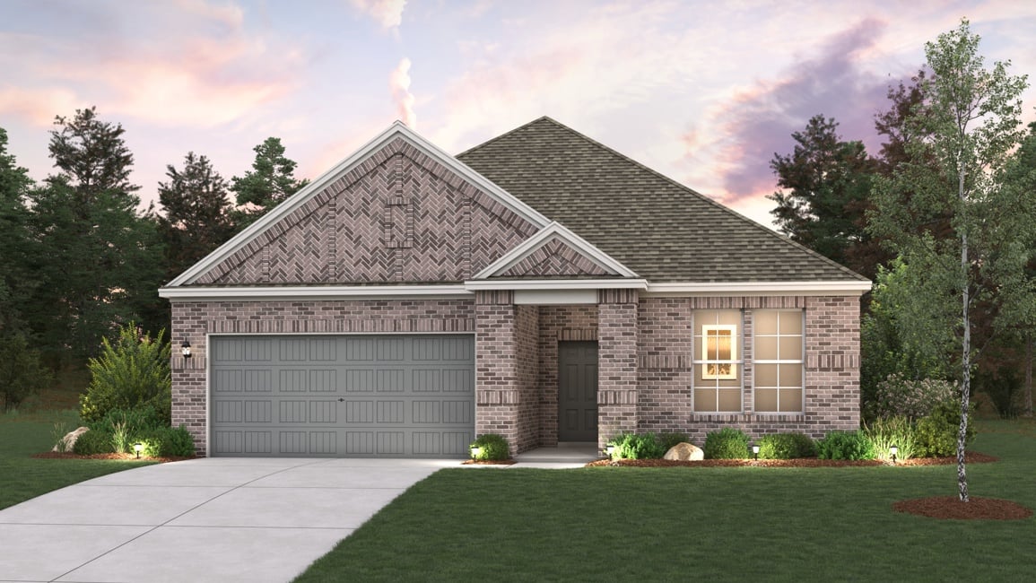 A house with a garage and a lawn in front of it.