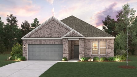 A house with a garage and a lawn in front of it.