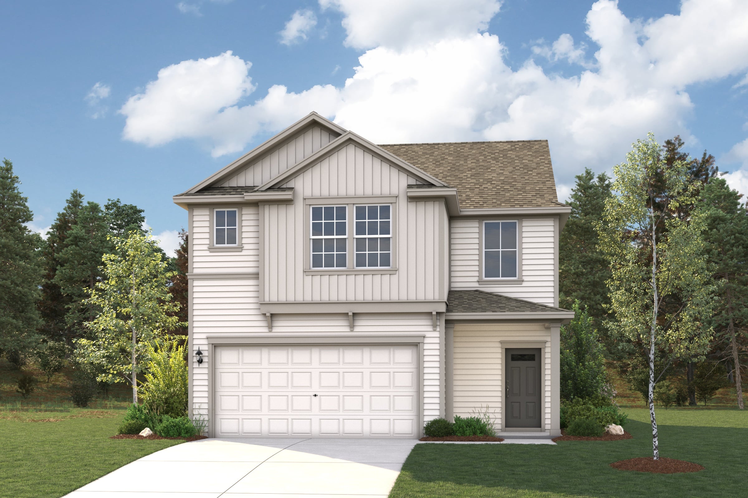 A house with a garage and trees.