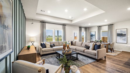 A living room with a large window.