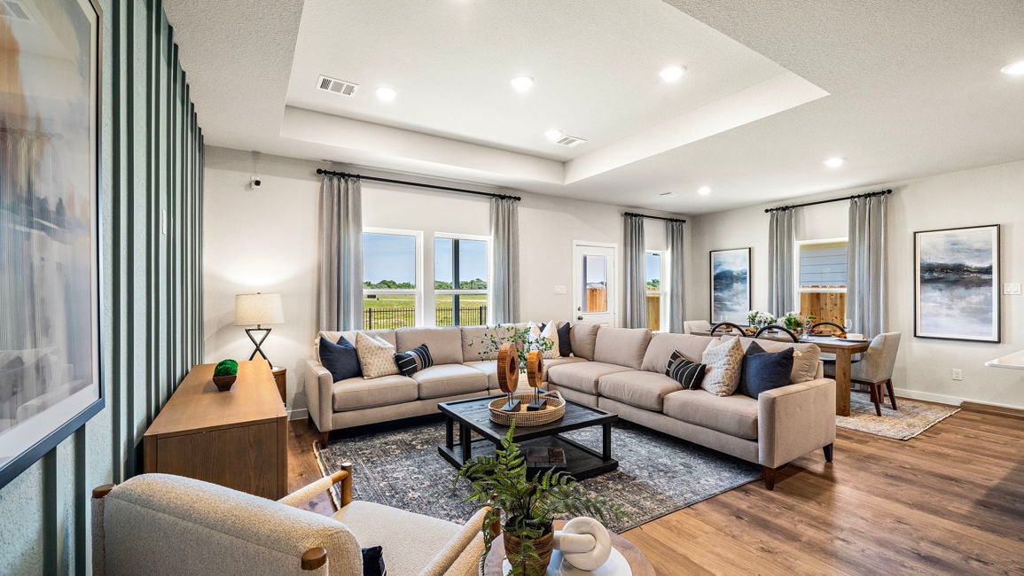 A living room with a large window.