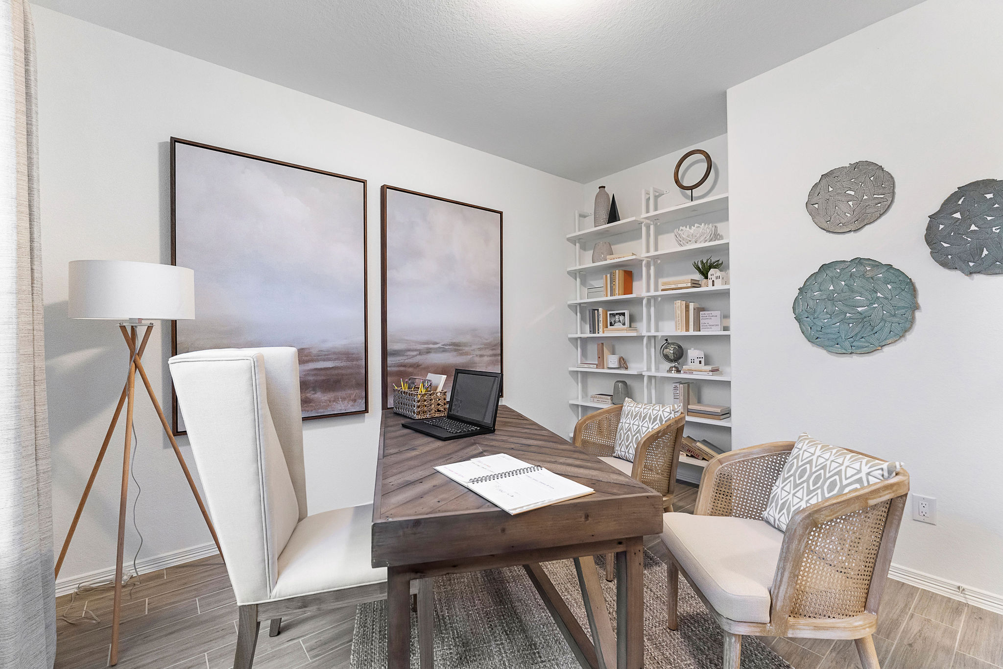 A room with a table and chairs.