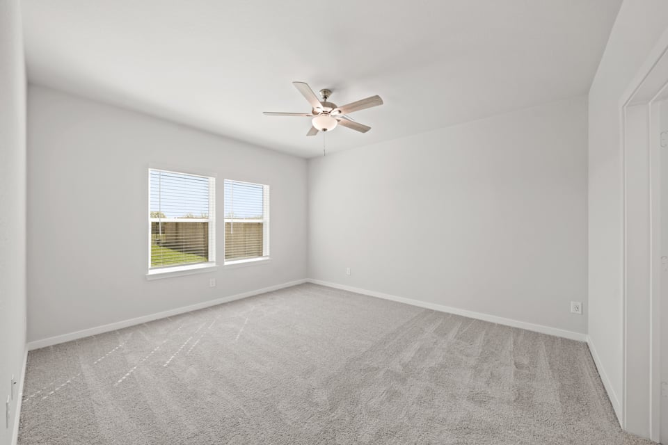 A ceiling fan in a room.