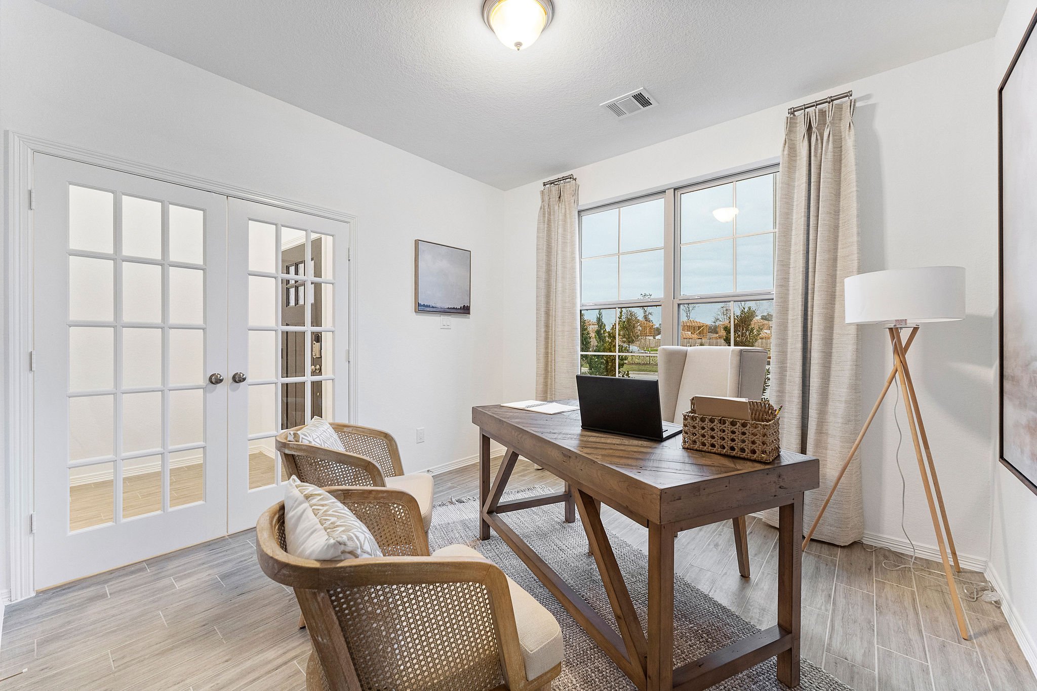 A room with a table and chairs.