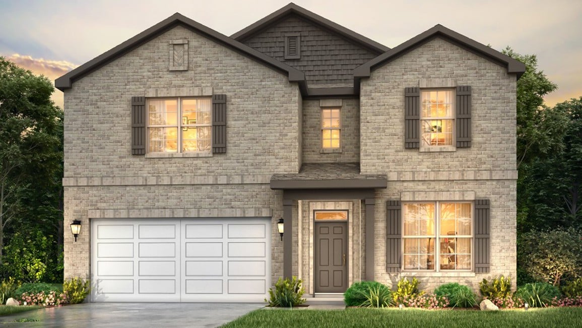 A house with a garage and a pond in front of it.