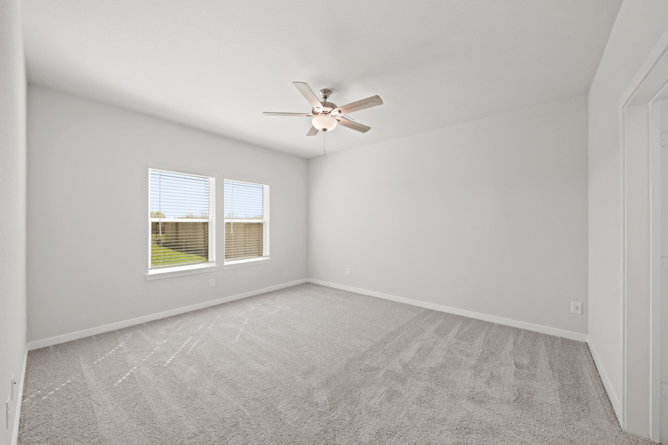 A ceiling fan in a room.