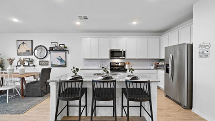 A kitchen with a large island.