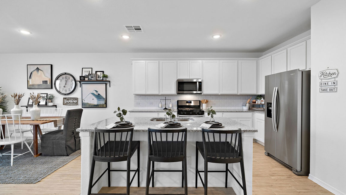 A kitchen with a large island.