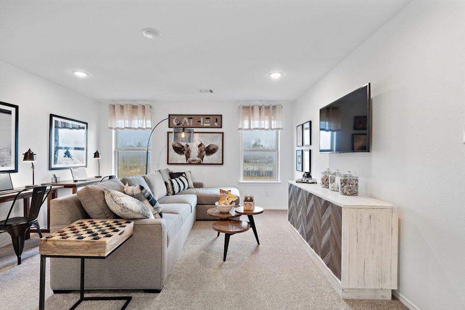 A living room with a couch and a coffee table.
