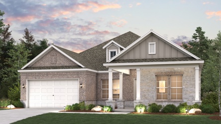 A house with a garage with American Gothic House in the background.