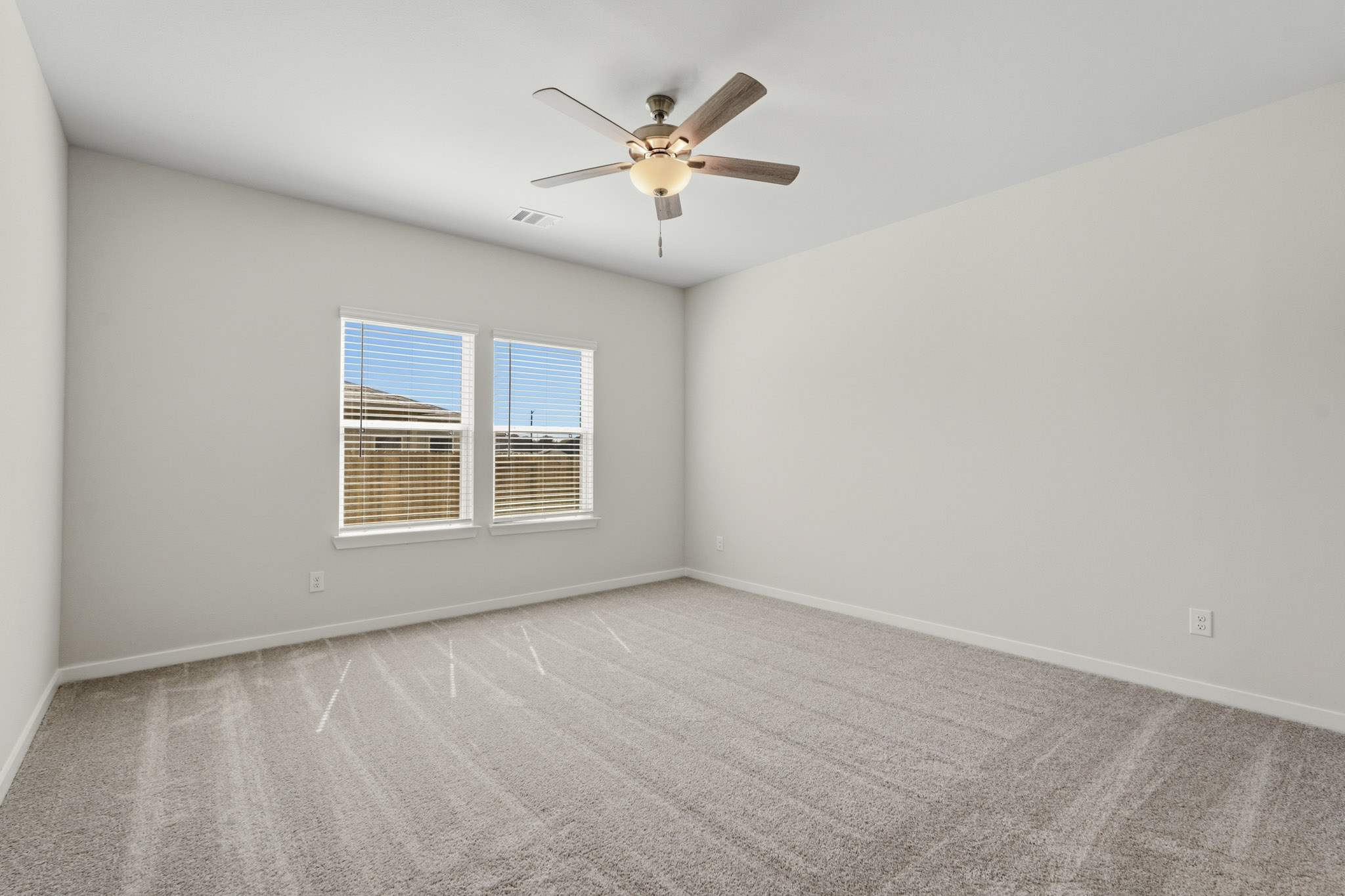 A ceiling fan in a room.