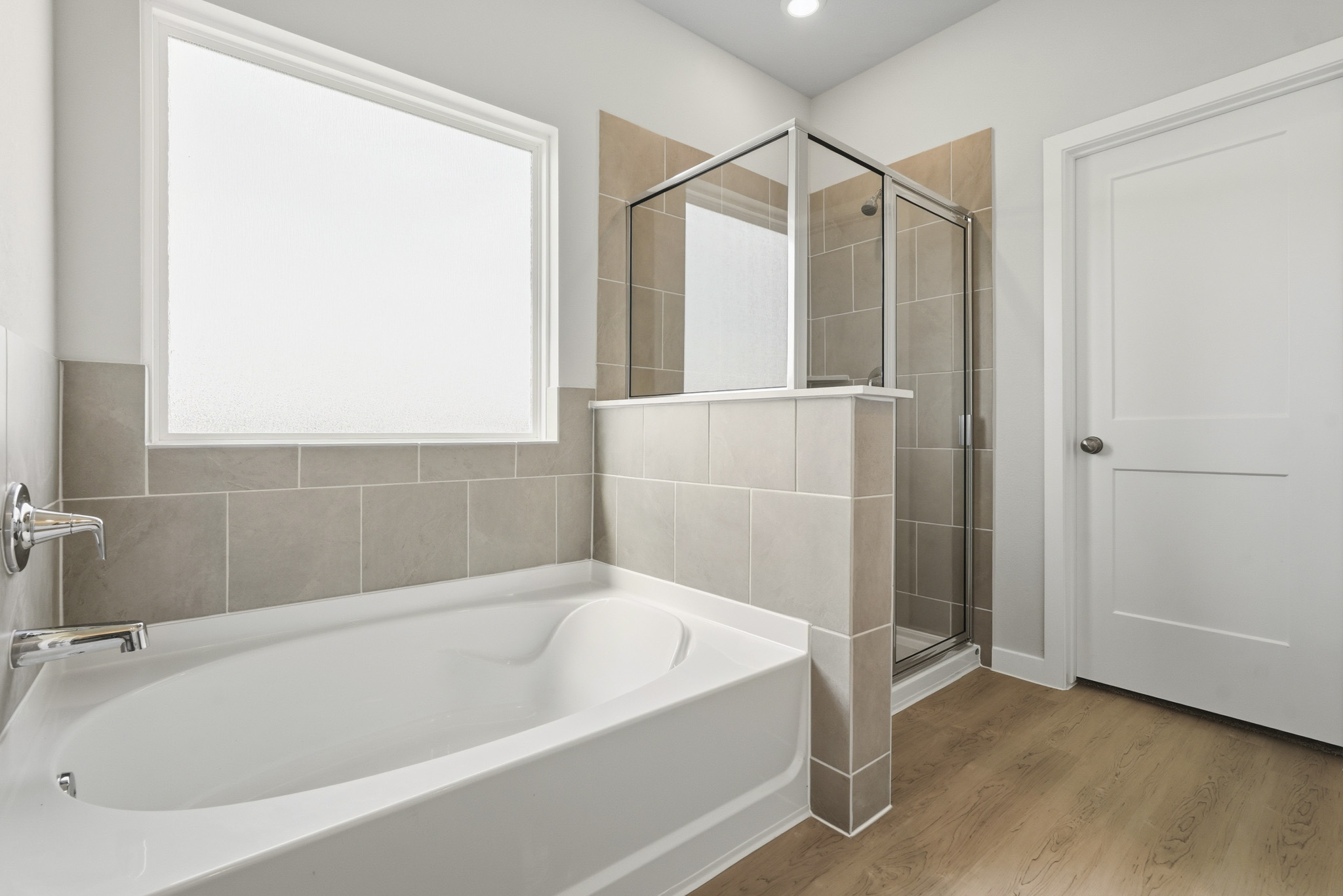 A bathroom with a glass shower.
