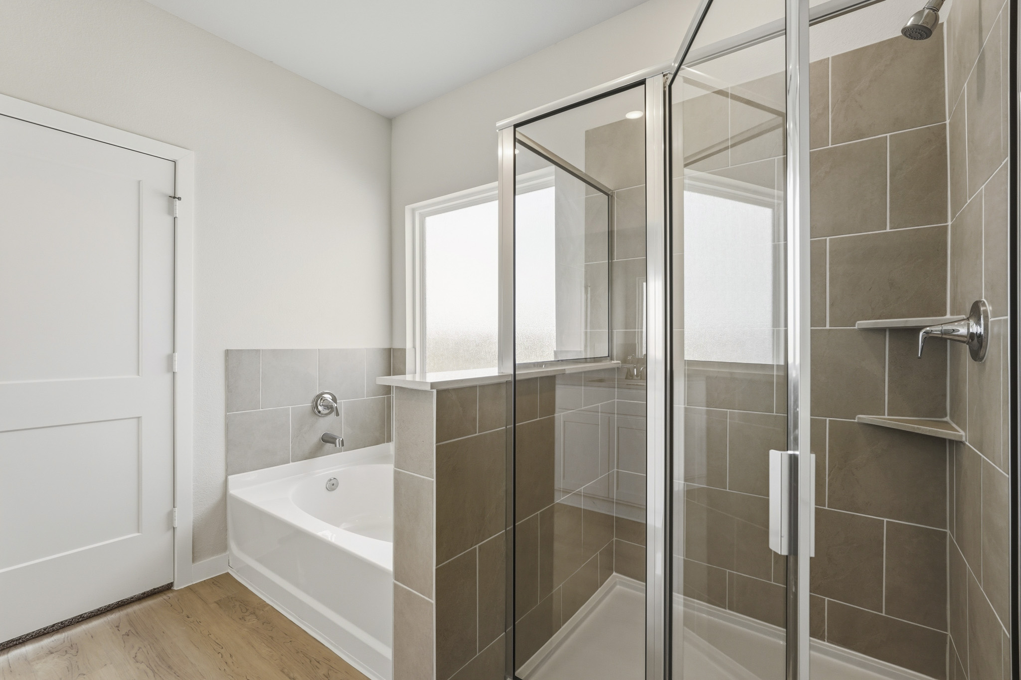 A bathroom with a glass shower.