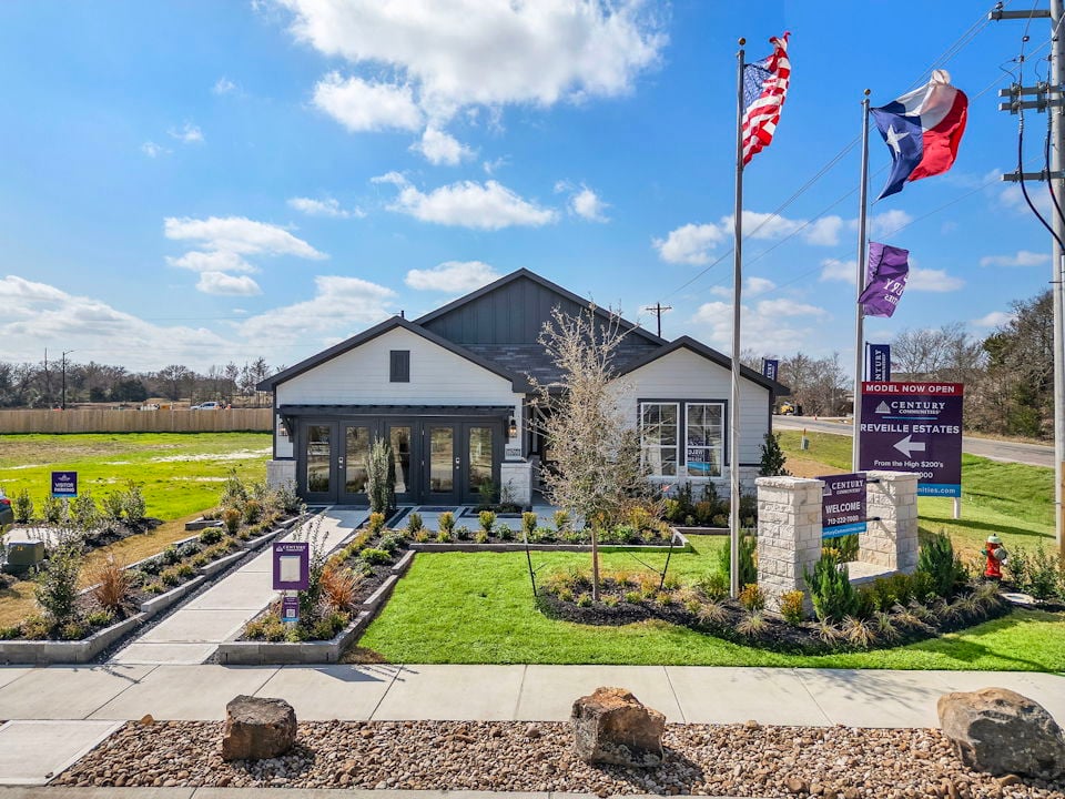 A building with flags in front of it.