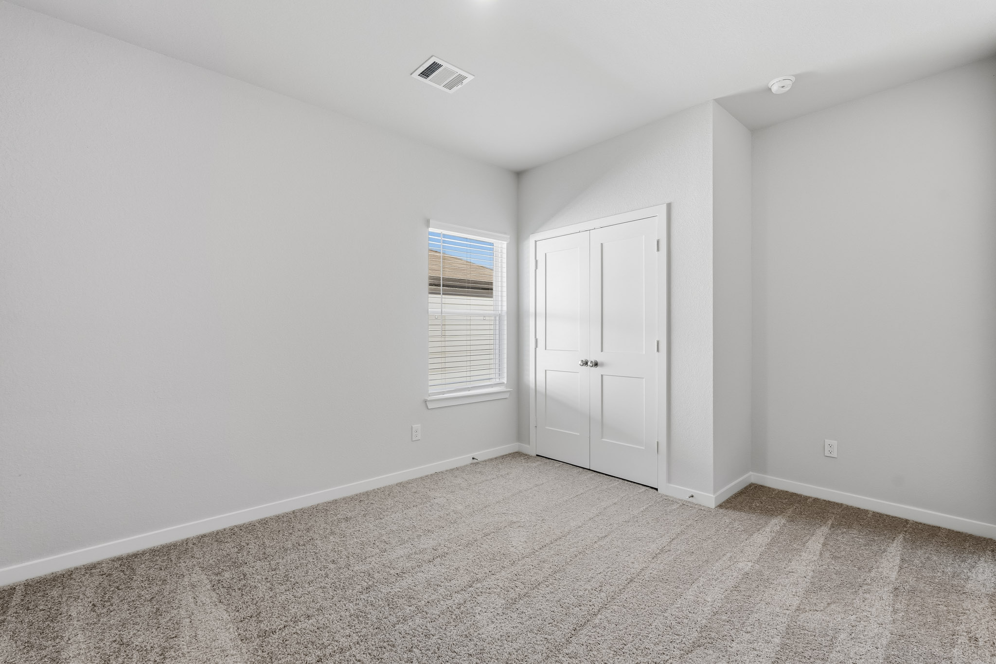 A room with white doors.