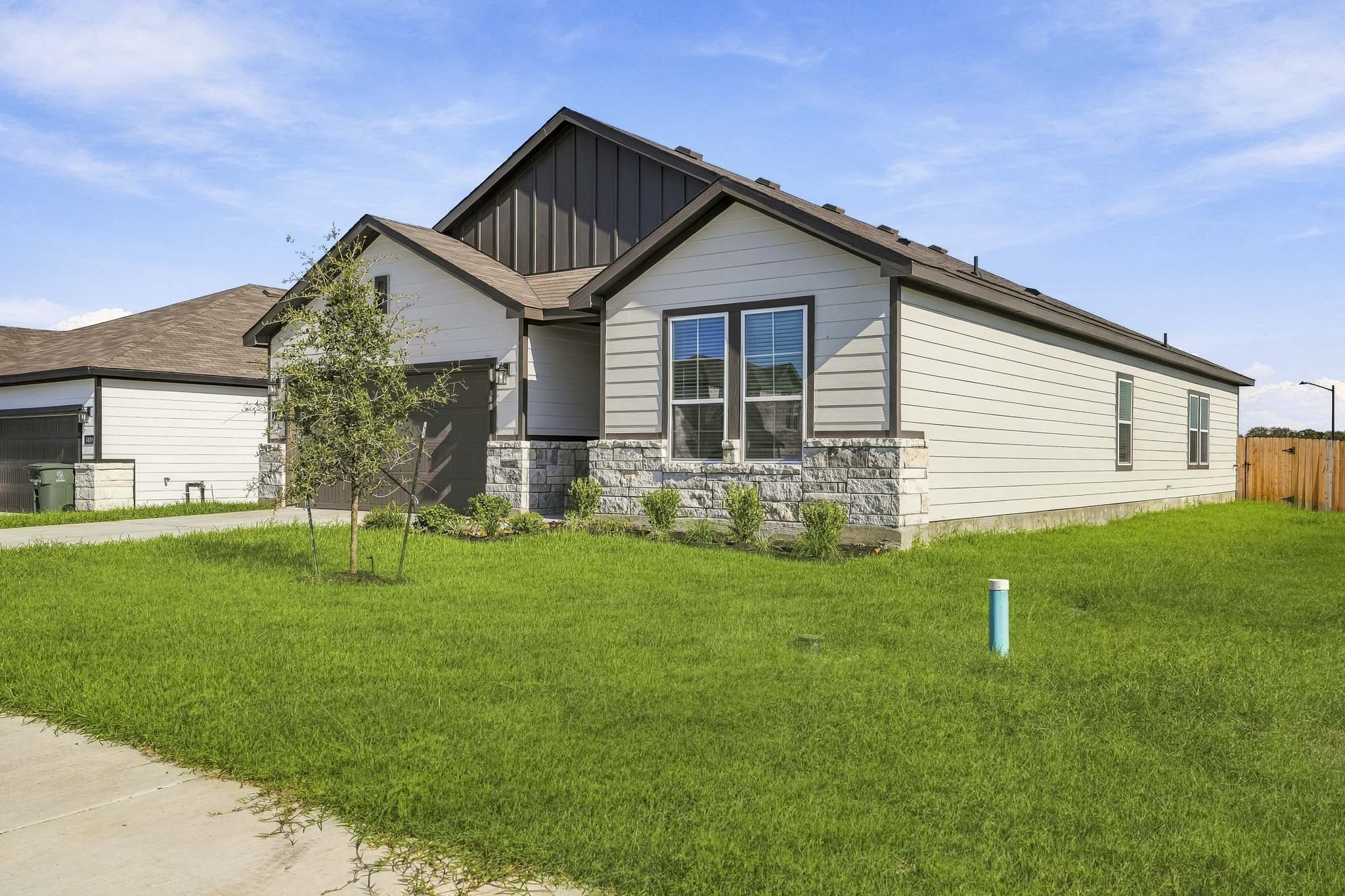 A house with a lawn.