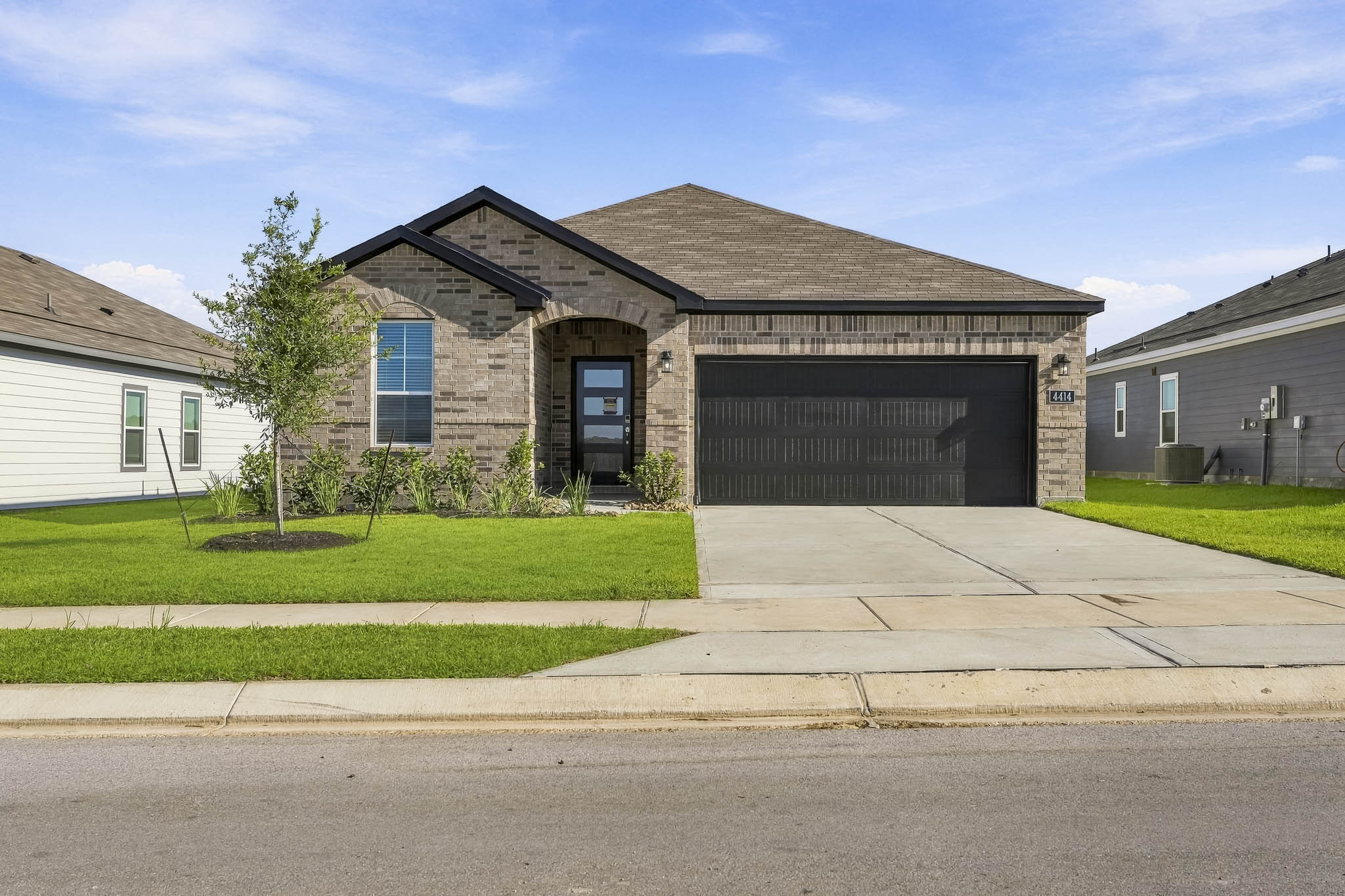 A house with a driveway.