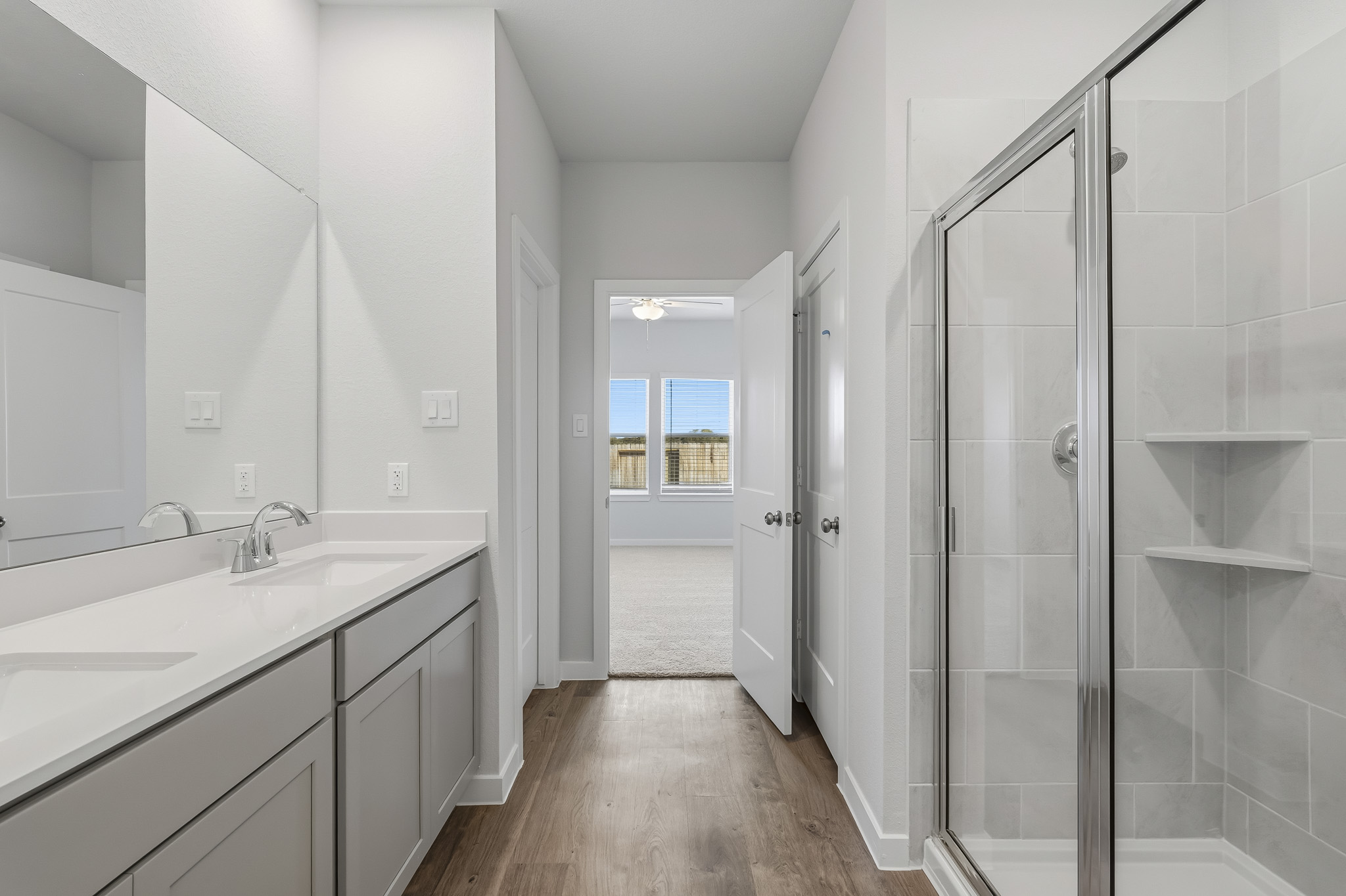 A bathroom with a glass shower.