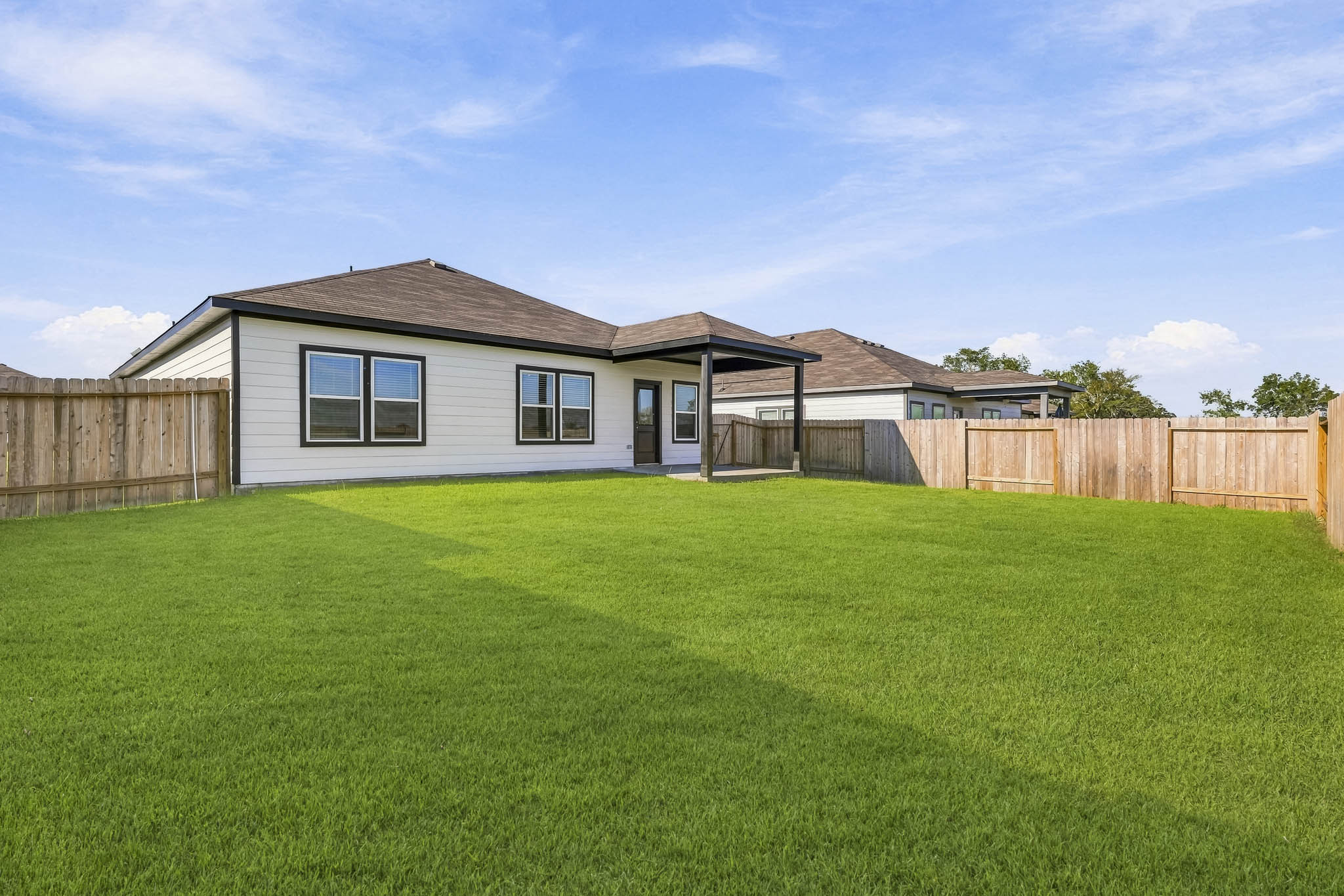 A house with a fence around it.