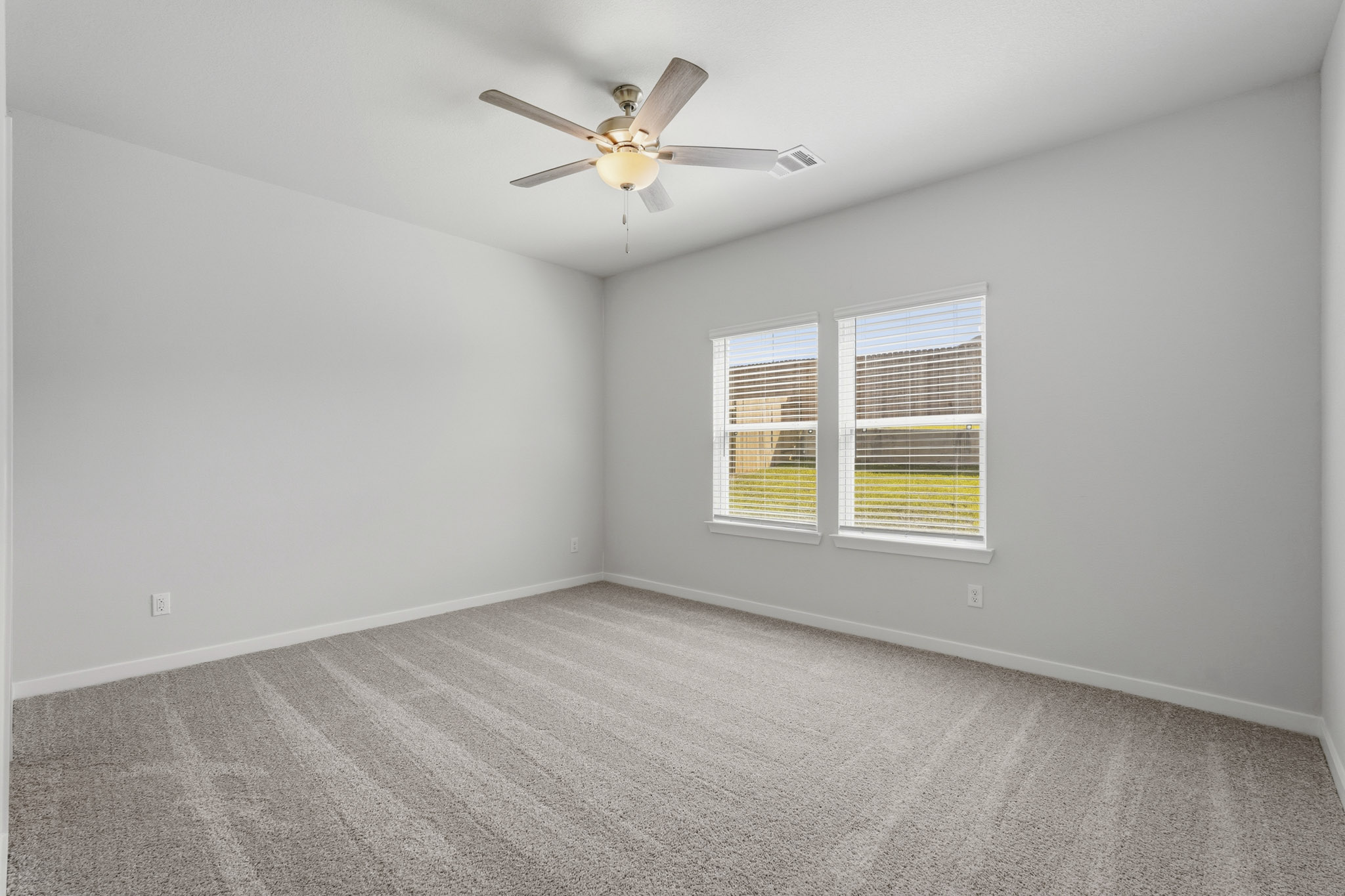 A ceiling fan in a room.