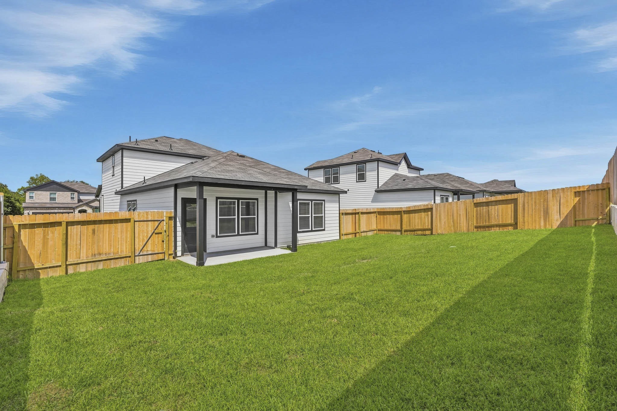 A house with a fence around it.