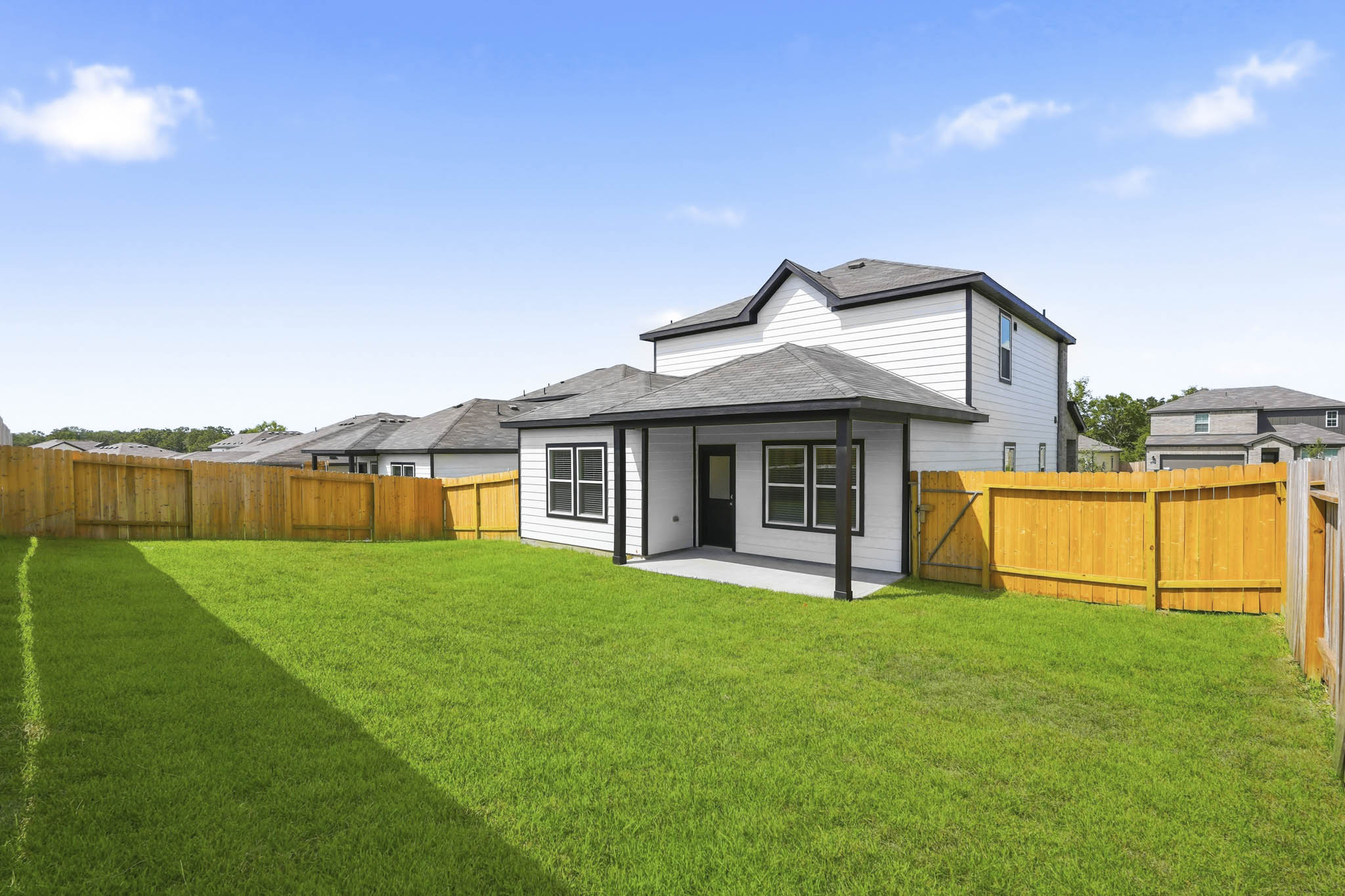 A house with a fence around it.