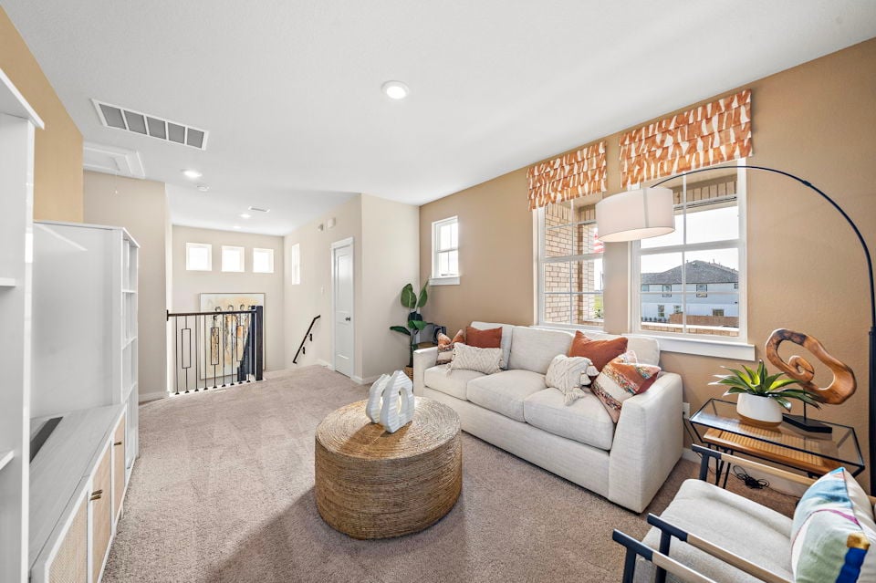 A living room with a large window.