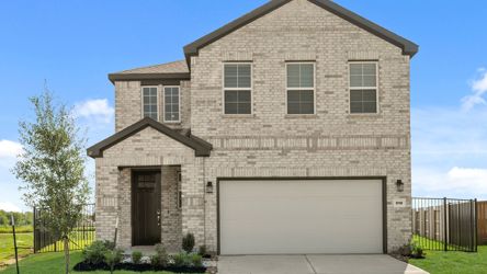 A grey house with a garage.