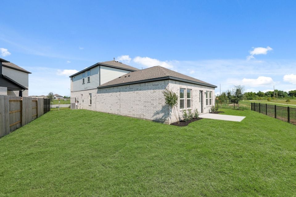 A house with a fence around it.