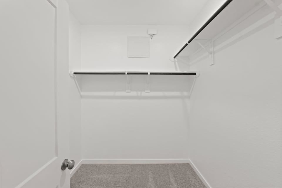 A white room with a white wall.