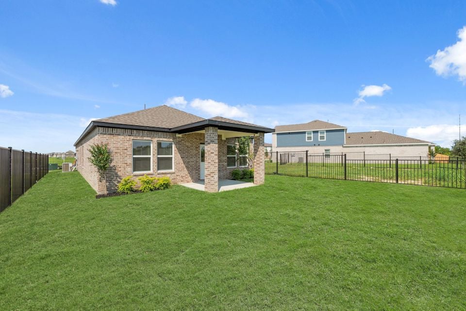 A house with a fence around it.