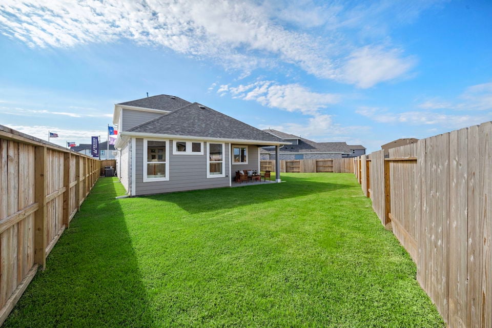 A house with a fence around it.