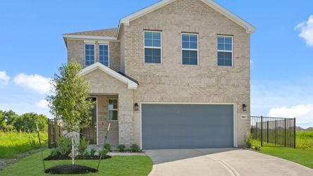 A large house with a driveway.