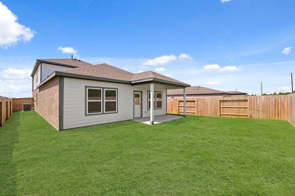A house with a fence around it.
