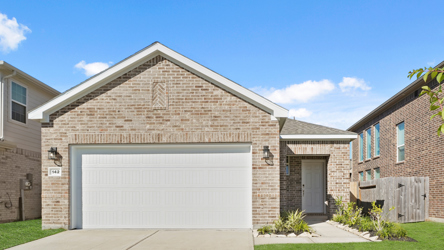 A garage in a brick building.