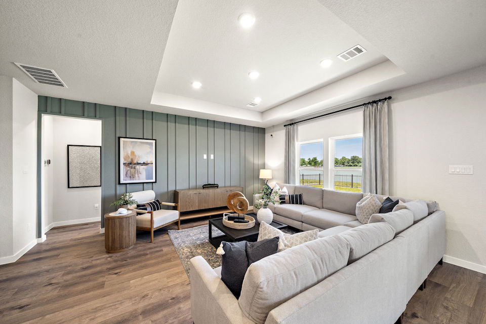 A living room with a large window.