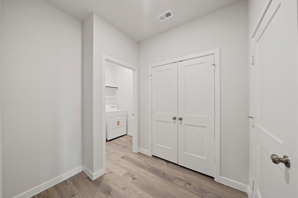 A room with white doors.