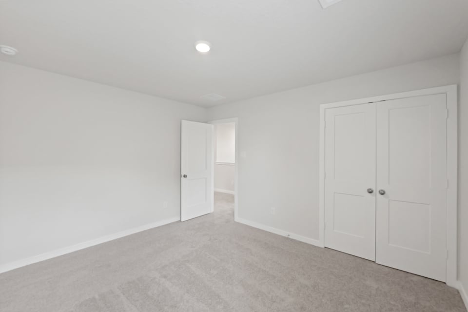 A room with white doors.