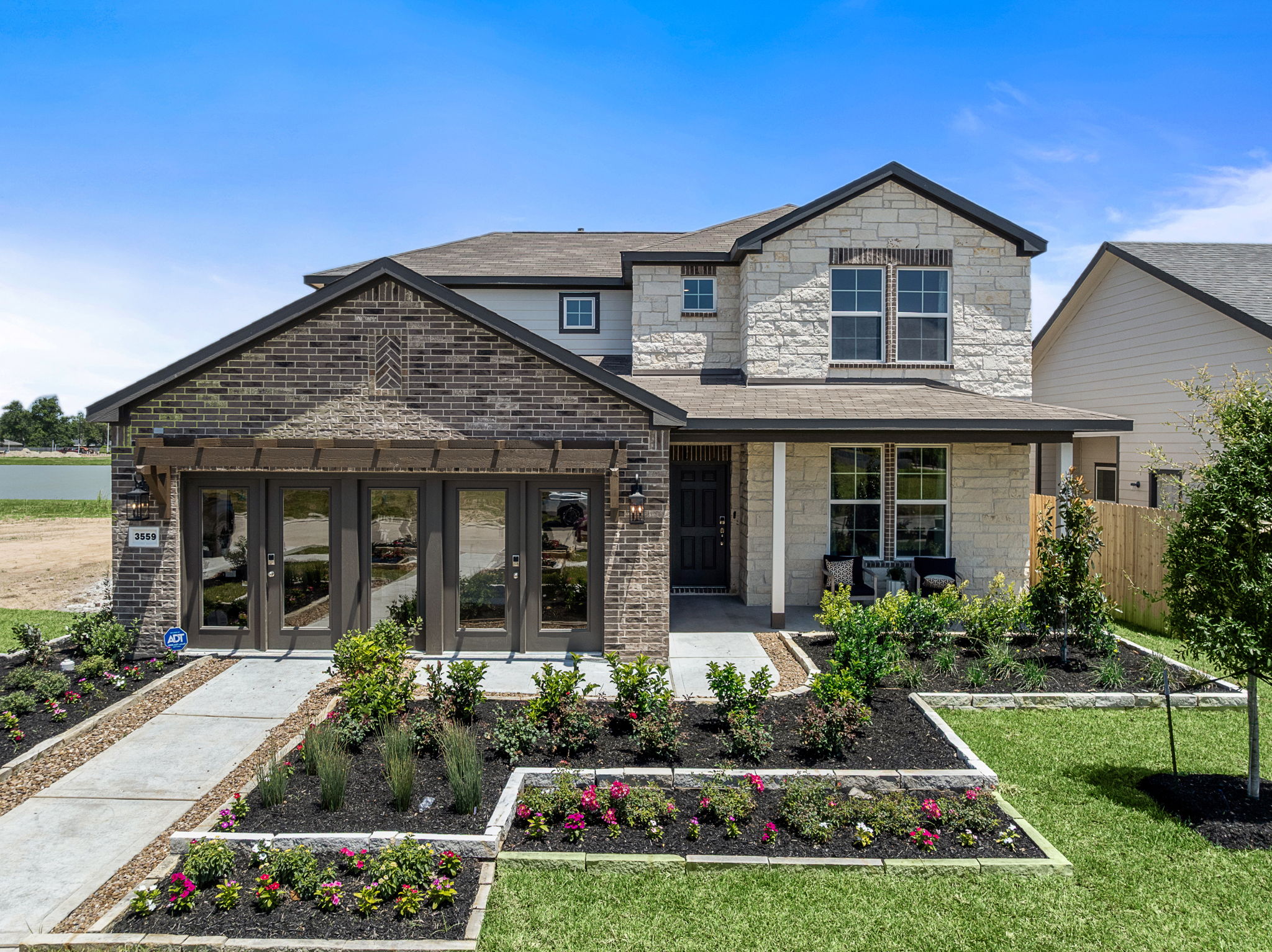 A house with a large front yard.
