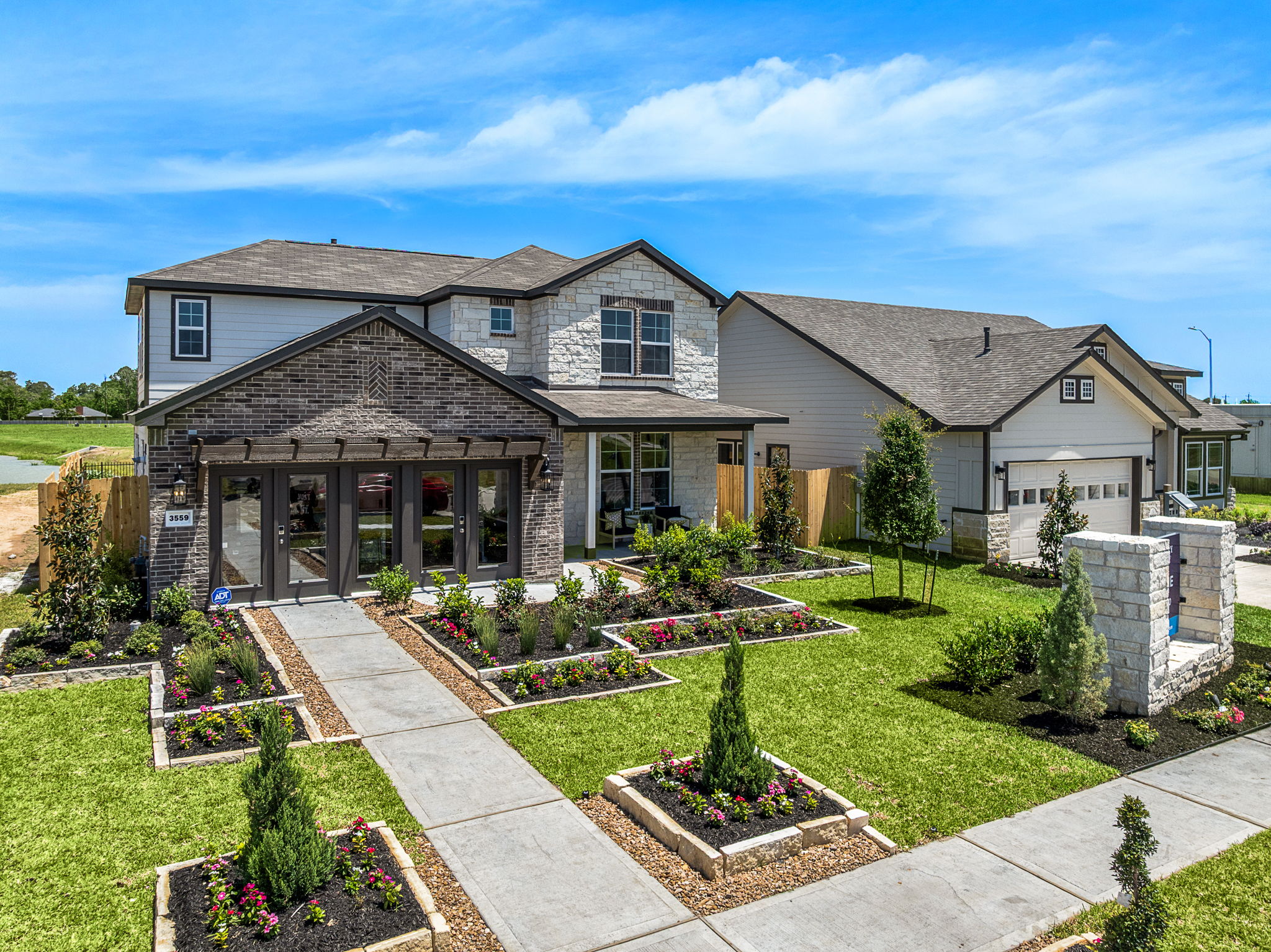 A house with a large front yard.
