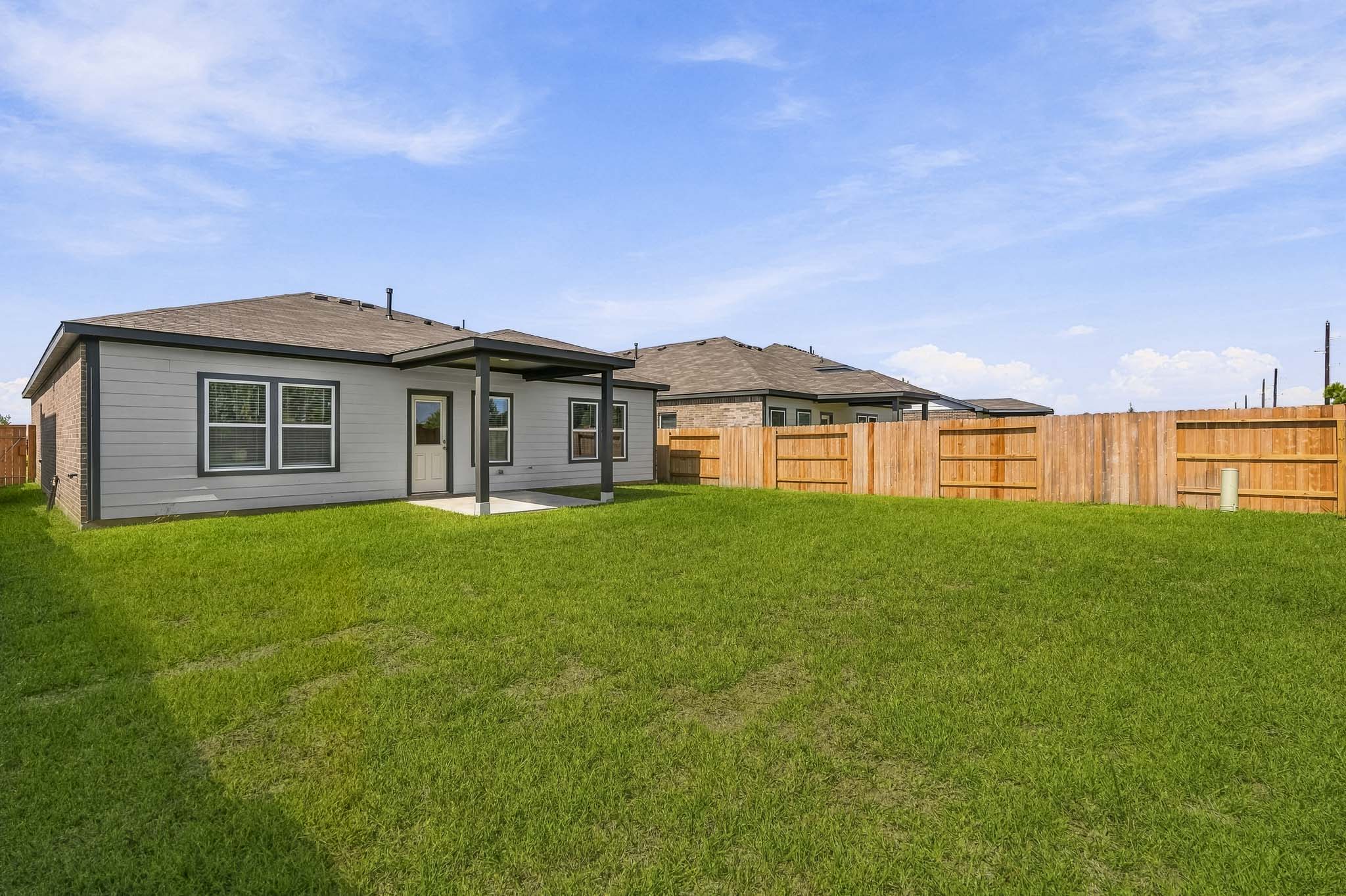 A house with a fence around it.