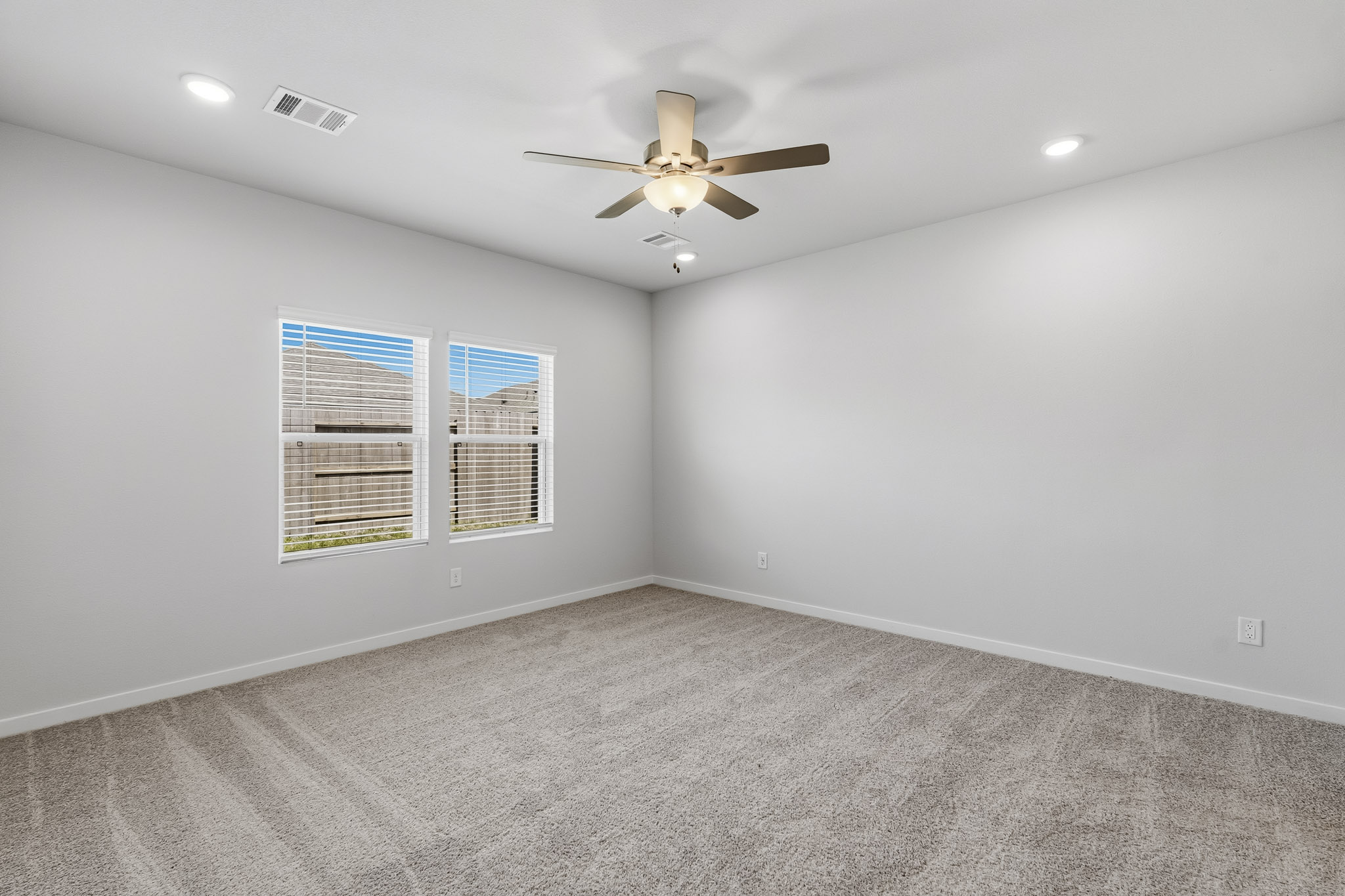 A ceiling fan in a room.