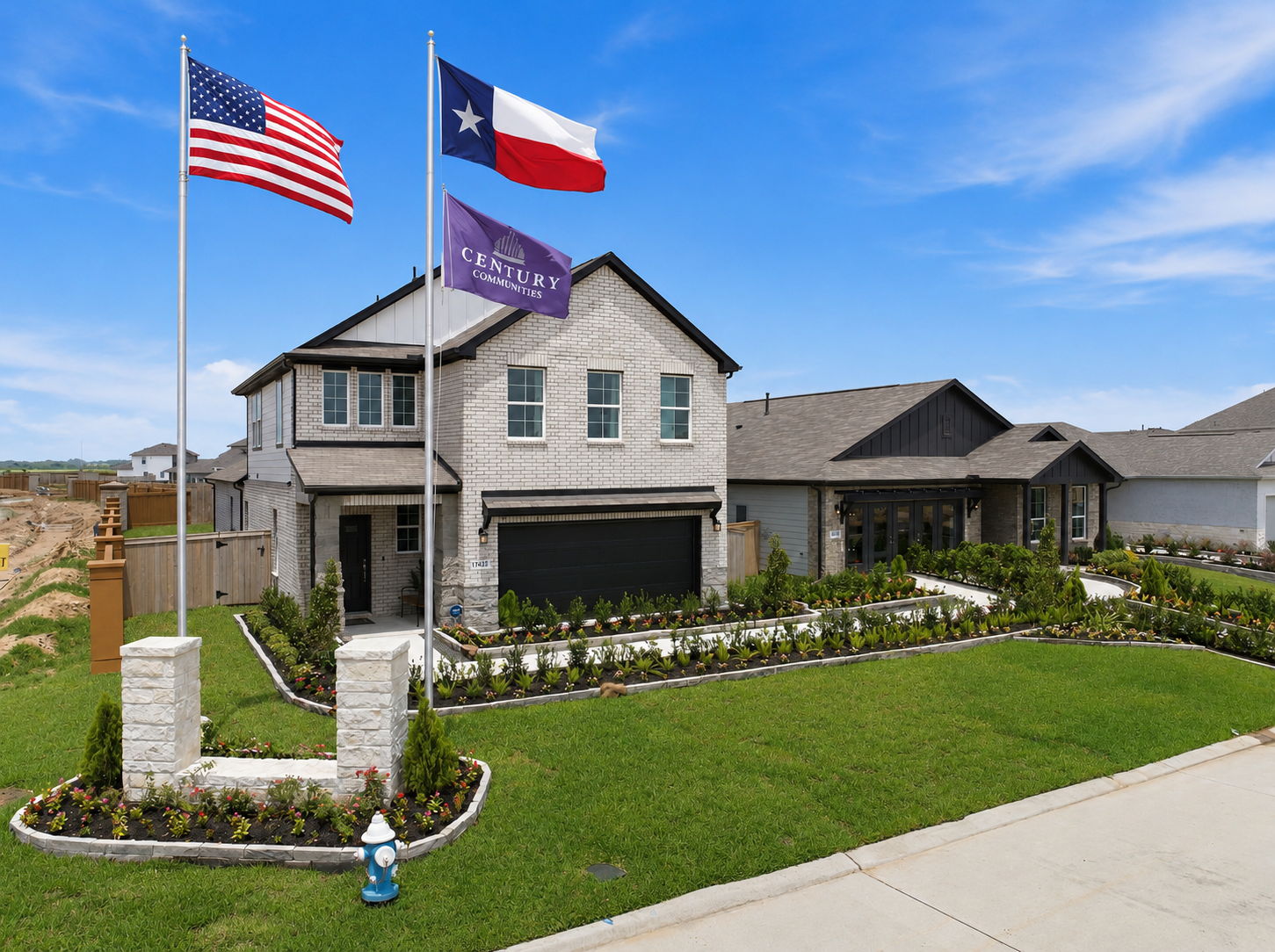 A house with flags in the front.