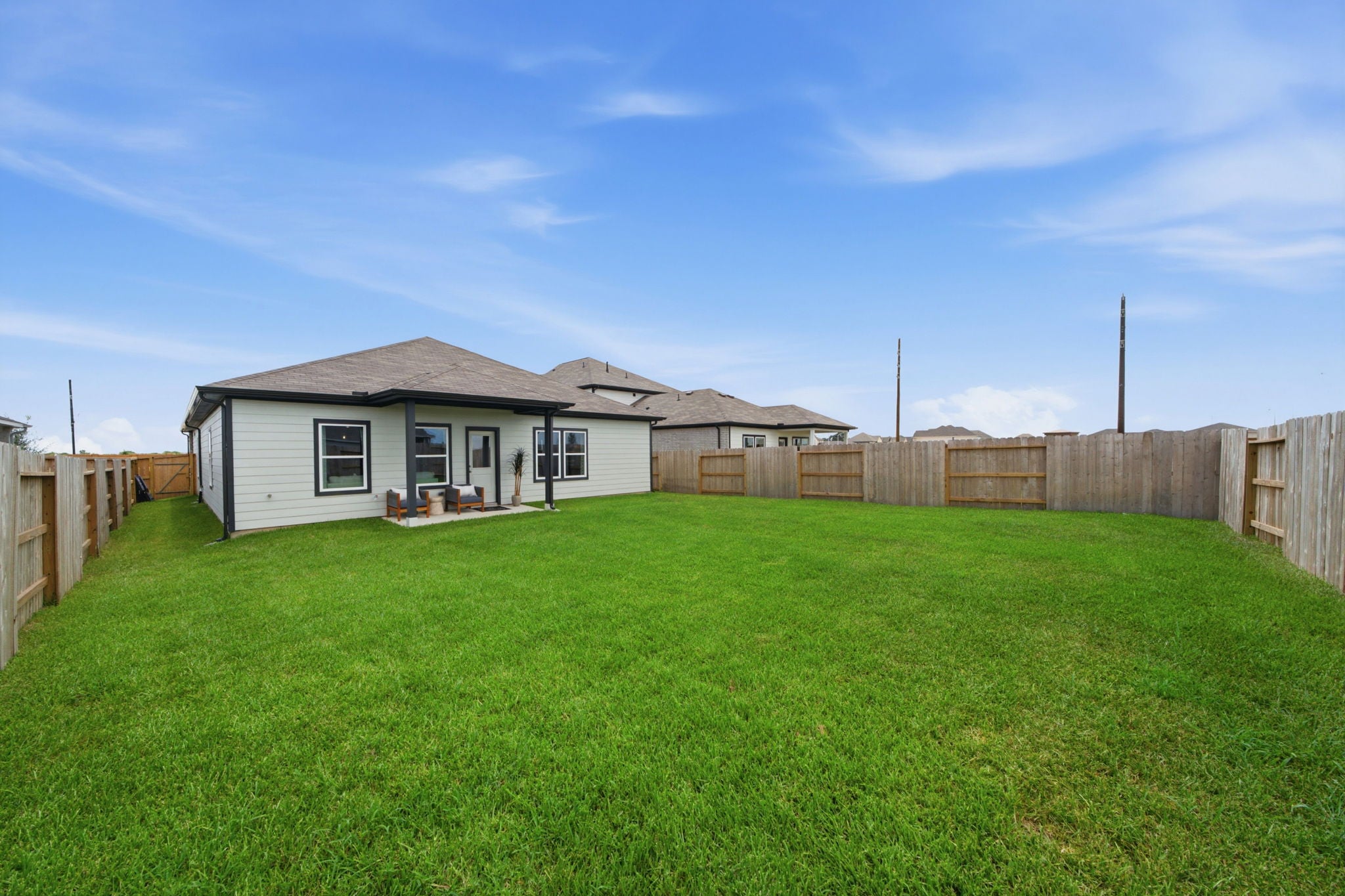 A house with a fence around it.