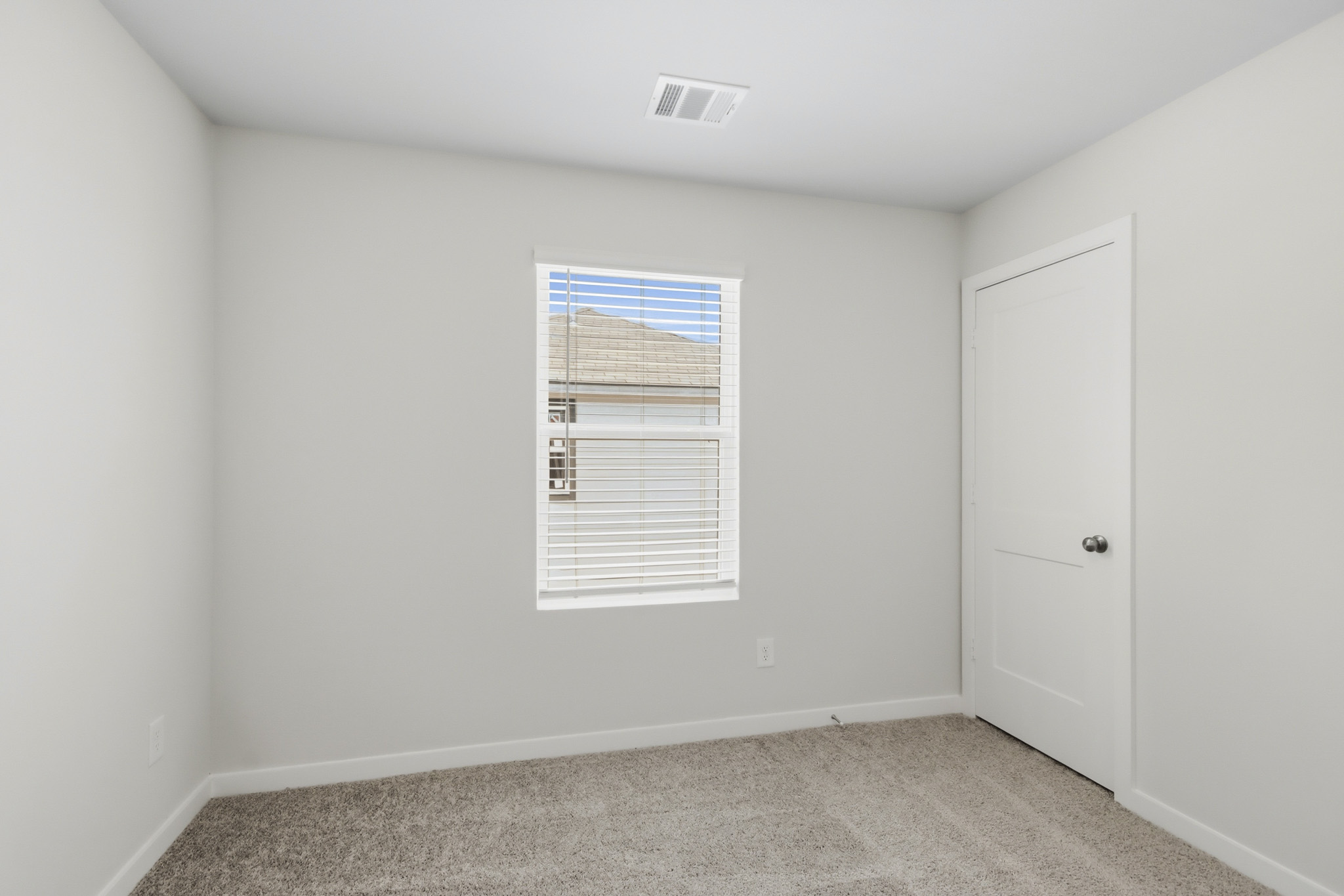 A room with white doors.