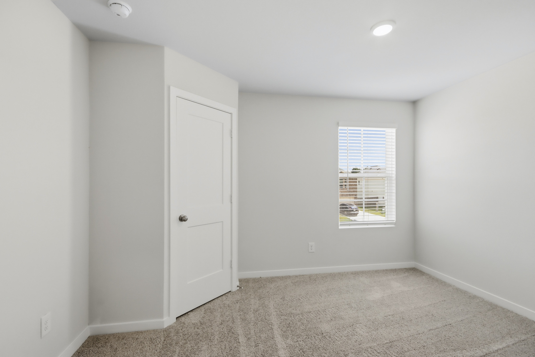 A room with white doors.